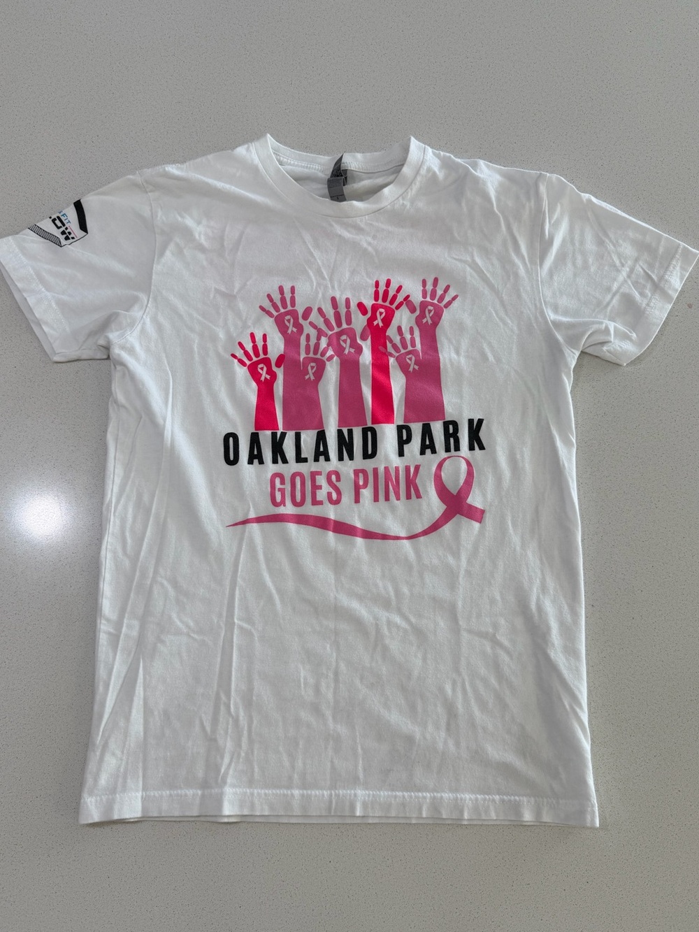 Next Level Apparel White Tee with Pink Graphics